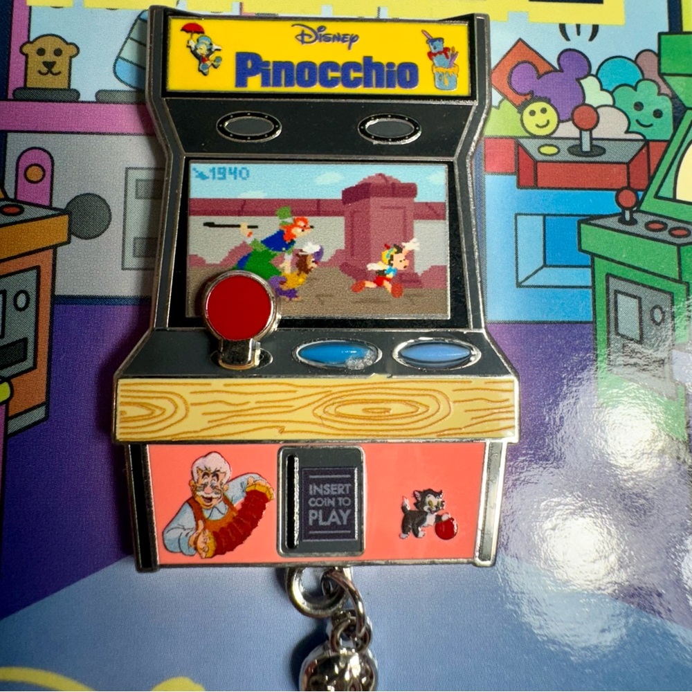 NWT. NWT. Disney pin trading pin. Pinnochio Disney Arcade series pin LE. Dangle